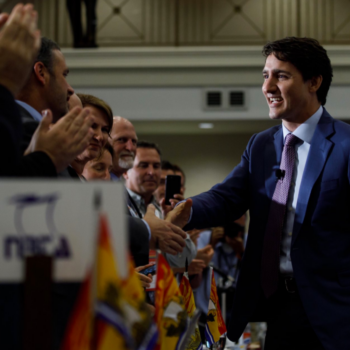 Justin Trudeau shakes hands of AGM 2019 delegates.